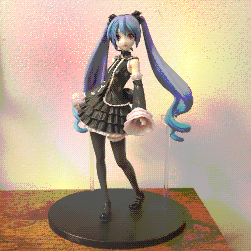 figure of a black and white hatsune miku figure.